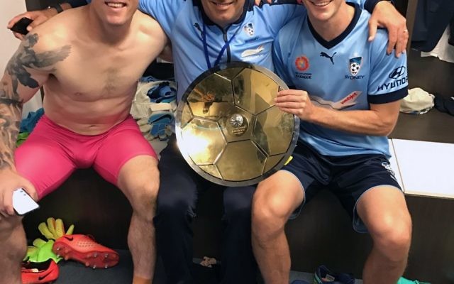 Michael Swibel (centre) flanked by Grand Final heroes Danny Vukovic and Male Wilkinson holding the Premiers' Plate. Michael Swibel (centre) flanked by Grand Final heroes Danny Vukovic and Male Wilkinson holding the Premiers' Plate.