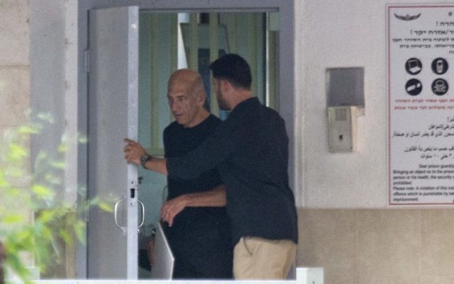 Former Prime Minister Ehud Olmert leaving jail.