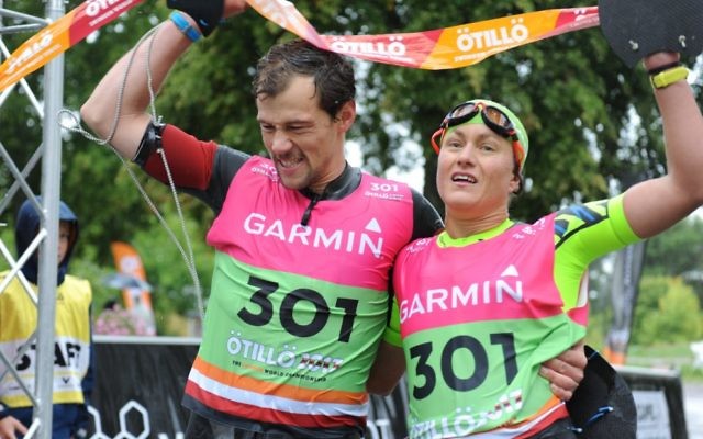Aussie Adriel Young and Swede Eva Nystrom cross the finish line first in the mixed division at the 2017 SwimRun World Championships on September 4. Photo: Jakob Edholm/Otillo