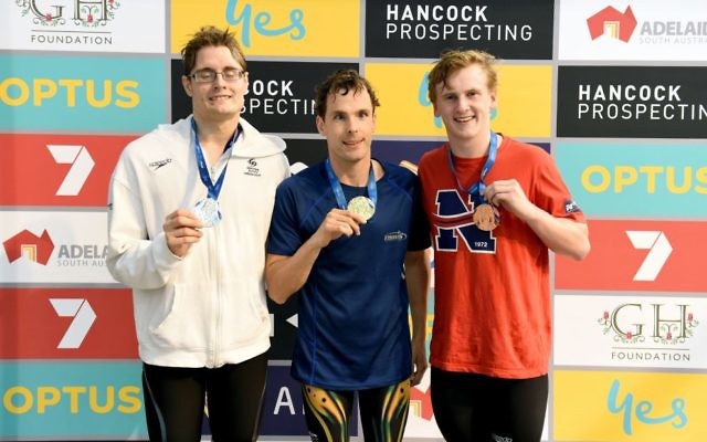 Matthew Levy (centre) wearing one of two gold medals he won at the 2017 Australian Short Course Championships in Adelaide last week. Photo: Delly Carr / Swimming Australia Matthew Levy (centre) wearing one of two gold medals he won at the 2017 Australian Short Course Championships in Adelaide last week. Photo: Delly Carr / Swimming Australia