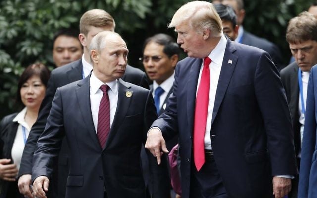 Vladimir Putin (left) and Donald Trump in Vietnam on Saturday. Photo: EPA/Jorge Silva Vladimir Putin (left) and Donald Trump in Vietnam on Saturday. Photo: EPA/Jorge Silva