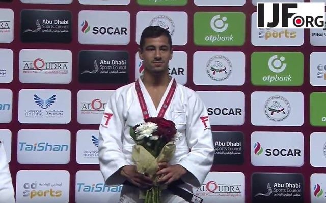 Tal Flicker receiving his medal. Tal Flicker receiving his medal.