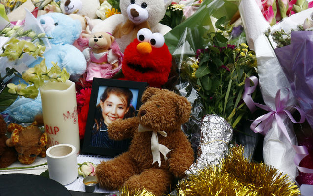 A photo of Thalia Hakin amid floral and soft-toy tributes at the site of last January's Bourke Street tragedy. Photo: Peter Haskin A photo of Thalia Hakin amid floral and soft-toy tributes at the site of last January's Bourke Street tragedy. Photo: Peter Haskin