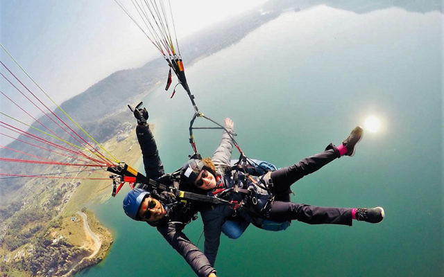 Debby Zwi paragliding with an instructor in Nepal is the winning entry in The AJN's holiday photo competition. Debby Zwi paragliding with an instructor in Nepal is the winning entry in The AJN's holiday photo competition.
