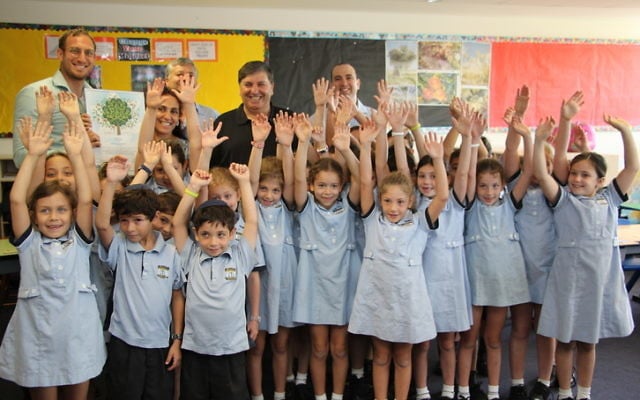 Year 2 Moriah College students with (back from left) Rabbi Benji Levy, teacher Michal Levy-Hardy, KKL-JNF head of education Shlomo Deri, KKL-JNF world chairperson Danny Atar and JNF Australia education shaliah Yigal Nisell. Photo: Shane Desiatnik Year 2 Moriah College students with (back from left) Rabbi Benji Levy, teacher Michal Levy-Hardy, KKL-JNF head of education Shlomo Deri, KKL-JNF world chairperson Danny Atar and JNF Australia education shaliah Yigal Nisell. Photo: Shane Desiatnik