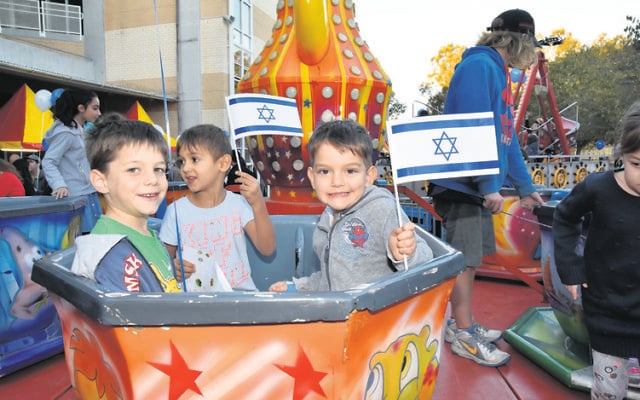 Children at Yom Ha'atzmaut last year. Photo: Noel Kessel Children at Yom Ha'atzmaut last year. Photo: Noel Kessel