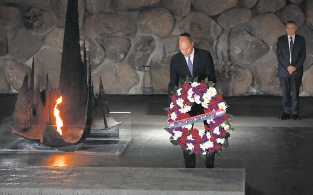 Prince William laying a wreath in the Hall of Remembrance at Yad Vashem. Photo:
EPA/Abir Sultan Prince William laying a wreath in the Hall of Remembrance at Yad Vashem. Photo:
EPA/Abir Sultan