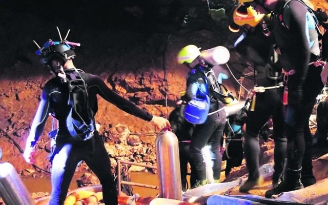 Rescuers inside the cave in Thailand where the boys were trapped. EPA/Royal Thai Navy Rescuers inside the cave in Thailand where the boys were trapped. EPA/Royal Thai Navy