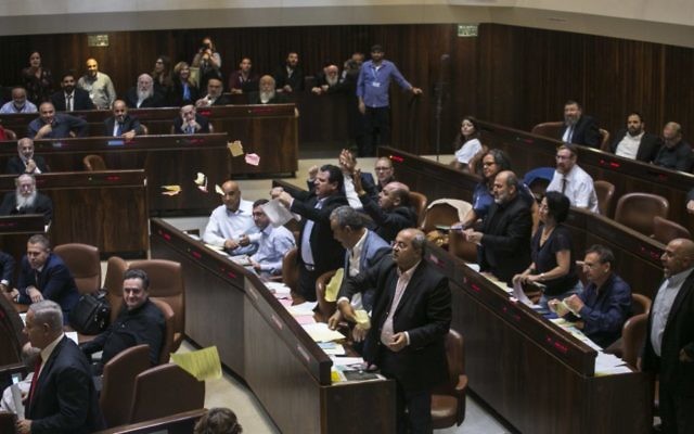 Arab lawmakers protest as the Knesset debates the nation-state bill. Photo: AP Photo/Olivier Fitoussi Arab lawmakers protest as the Knesset debates the nation-state bill. Photo: AP Photo/Olivier Fitoussi