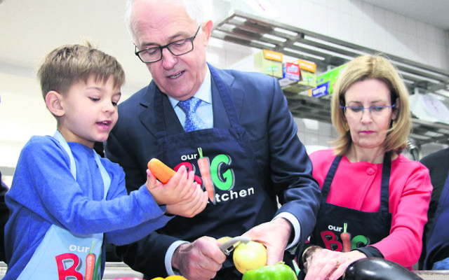 Look, this is how you do it! Jack at Our Big Kitchen with his grandfather, Prime Minister Malcolm Turnbull, and Vaucluse MP Gabrielle Upton.
Photo: Shane Desiatnik Look, this is how you do it! Jack at Our Big Kitchen with his grandfather, Prime Minister Malcolm Turnbull, and Vaucluse MP Gabrielle Upton.
Photo: Shane Desiatnik
