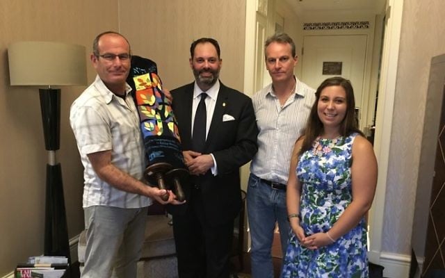 With the rejuvenated Sefer Torah, from left, Dvir Bar-Gal, Philip Dalidakis, Drew Nuland and Kehilat Shanghai's community coordinator Hannah Maia Frishberg. With the rejuvenated Sefer Torah, from left, Dvir Bar-Gal, Philip Dalidakis, Drew Nuland and Kehilat Shanghai's community coordinator Hannah Maia Frishberg.