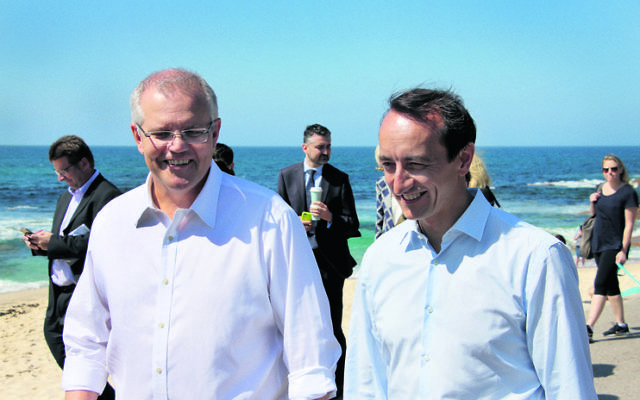 Scott Morrison (left) and Dave Sharma at Bronte Beach. Photo: Gareth Narunsky