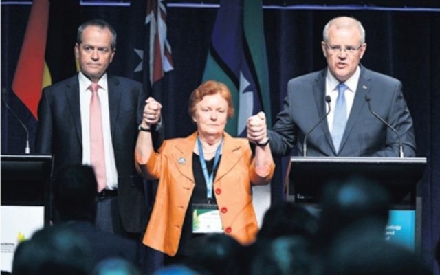 In a rare moment of unity Prime Minister Scott Morrison, Opposition Leader Bill Shorten and Cheryl Edwards, who led the advisory group for the apology, came together to apologise to survivors of institutional child sexual abuse. Photo: AAP Image