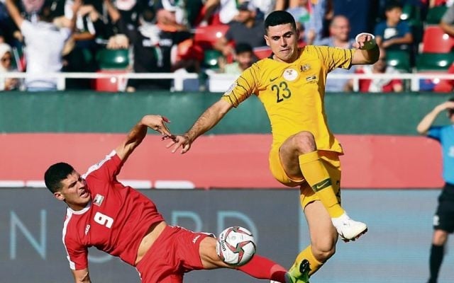 Tom Rogic (right) of Australia in action against Tamer Seyam (left) of Palestine during last Friday's match. Photo: EPA/Mahmoud Khaled Tom Rogic (right) of Australia in action against Tamer Seyam (left) of Palestine during last Friday's match. Photo: EPA/Mahmoud Khaled