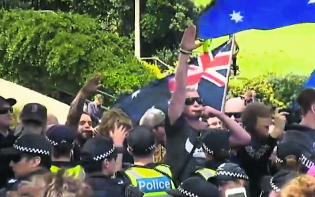 People at the rally performed Nazi salutes. Photo: Screengrab, ABC News People at the rally performed Nazi salutes. Photo: Screengrab, ABC News
