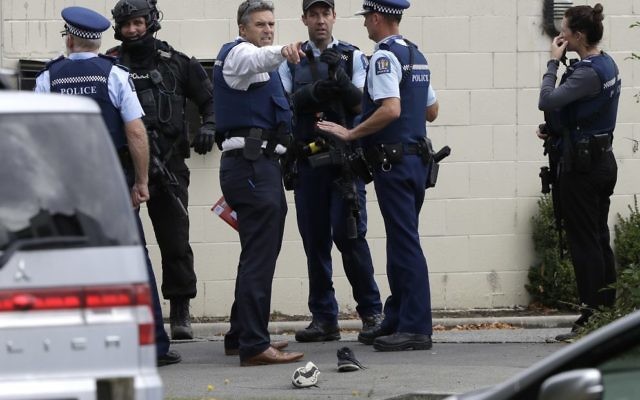 Police stand outside a mosque in central Christchurch, New Zealand, Friday, March 15, 2019. Multiple people were killed in mass shootings at two mosques full of people attending Friday prayers, as New Zealand police warned people to stay indoors as they tried to determine if more than one gunman was involved. (AP Photo/Mark Baker) Police stand outside a mosque in central Christchurch, New Zealand, Friday, March 15, 2019. Multiple people were killed in mass shootings at two mosques full of people attending Friday prayers, as New Zealand police warned people to stay indoors as they tried to determine if more than one gunman was involved. (AP Photo/Mark Baker)