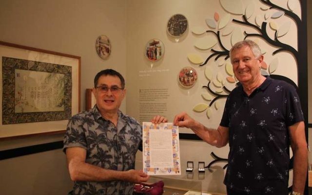 Ilan Buchman and Oscar Shub hold their ketubah in front of the Sydney Jewish Museum's marriage display. Photos: Sophie Deutsch Ilan Buchman and Oscar Shub hold their ketubah in front of the Sydney Jewish Museum's marriage display. Photos: Sophie Deutsch