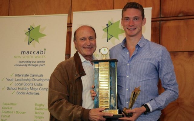Steven Solomon (right) accepting the Maccabi NSW Sportsman of the Year
award and Lou Rose Trophy from Maccabi World Union vice-president Tom
Goldman on March 31. Photo: Shane Desiatnik Steven Solomon (right) accepting the Maccabi NSW Sportsman of the Year
award and Lou Rose Trophy from Maccabi World Union vice-president Tom
Goldman on March 31. Photo: Shane Desiatnik