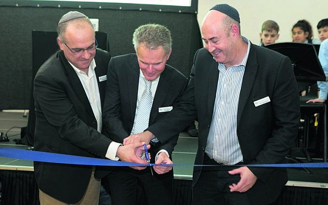 From left: Anthony Berman, Phil Roberts and Tim Greenstein cut the ribbon
to officially open Mount Sinai College’s revamped campus. Photo: Ofer Levy From left: Anthony Berman, Phil Roberts and Tim Greenstein cut the ribbon
to officially open Mount Sinai College’s revamped campus. Photo: Ofer Levy