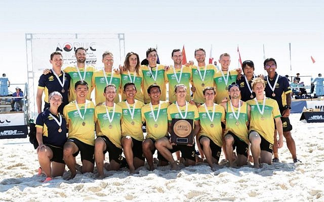 Melbourne’s Joel Moskovic (pictured in the front row, third from the left) and his teammates won bronze in the 2019 Asia-Pacific Beach Ultimate frisbee championships. Melbourne’s Joel Moskovic (pictured in the front row, third from the left) and his teammates won bronze in the 2019 Asia-Pacific Beach Ultimate frisbee championships.