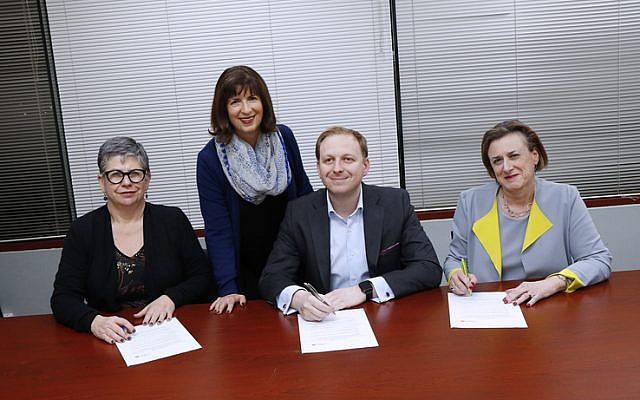 NCJWA (Vic) president Miriam Bass (second from left) oversees the signing of the NCJWA Gender Equality Pledge by
(from left) Jennifer Huppert (JCCV), Jeremy Leibler (ZFA) and Sharene Hambur (Zionism Victoria). Photo: Peter Haskin NCJWA (Vic) president Miriam Bass (second from left) oversees the signing of the NCJWA Gender Equality Pledge by
(from left) Jennifer Huppert (JCCV), Jeremy Leibler (ZFA) and Sharene Hambur (Zionism Victoria). Photo: Peter Haskin