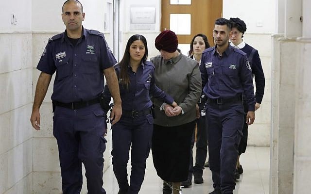 Malka Leifer is escorted by police as she arrives for a hearing at the District Court in Jerusalem, Feb. 27, 2018. Photo: Ahmad Gharabli/AFP/Getty Images Malka Leifer is escorted by police as she arrives for a hearing at the District Court in Jerusalem, Feb. 27, 2018. Photo: Ahmad Gharabli/AFP/Getty Images
