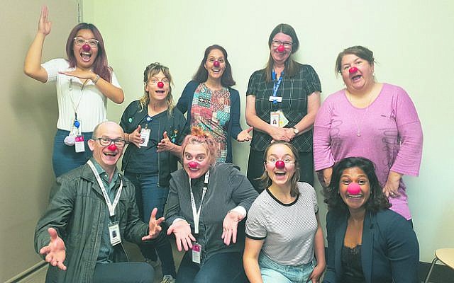 David Symons (bottom left), Shoshi Ofir (top, third from left) and the RCH’s
Victorian Paediatric Medical Service director Dr Anne Smith (top, second
from right) together with the RCH trainee clown doctors of the Humour
Foundation and Dream Doctors pilot program. David Symons (bottom left), Shoshi Ofir (top, third from left) and the RCH’s
Victorian Paediatric Medical Service director Dr Anne Smith (top, second
from right) together with the RCH trainee clown doctors of the Humour
Foundation and Dream Doctors pilot program.