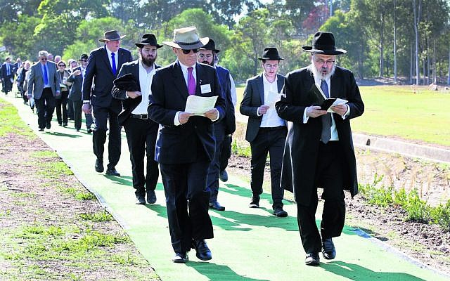 Consecration of the Jewish section at Rookwood Cemetery last year, led by Rabbi Yehoram Ulman. Photo: Noel Kessel Consecration of the Jewish section at Rookwood Cemetery last year, led by Rabbi Yehoram Ulman. Photo: Noel Kessel