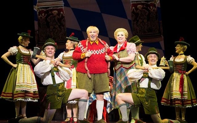 Jake Fehily as Augustus Gloop (centre) and Octavia Barron Martin as Mrs Gloop. Photo: Jeff Busby Jake Fehily as Augustus Gloop (centre) and Octavia Barron Martin as Mrs Gloop. Photo: Jeff Busby