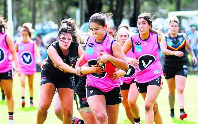 Izzy Worth on the charge for the Jackettes in the VAFA women’s Division 4
grand final against Glen Eira last Sunday. Photo: Peter Haskin Izzy Worth on the charge for the Jackettes in the VAFA women’s Division 4
grand final against Glen Eira last Sunday. Photo: Peter Haskin