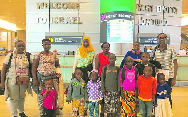 The Rwandan children and their
carers arriving at Ben Gurion Airport. The Rwandan children and their
carers arriving at Ben Gurion Airport.