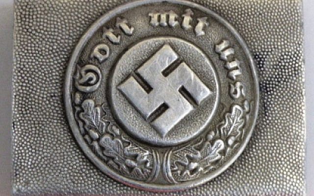 A German police buckle up for auction this week. A German police buckle up for auction this week.