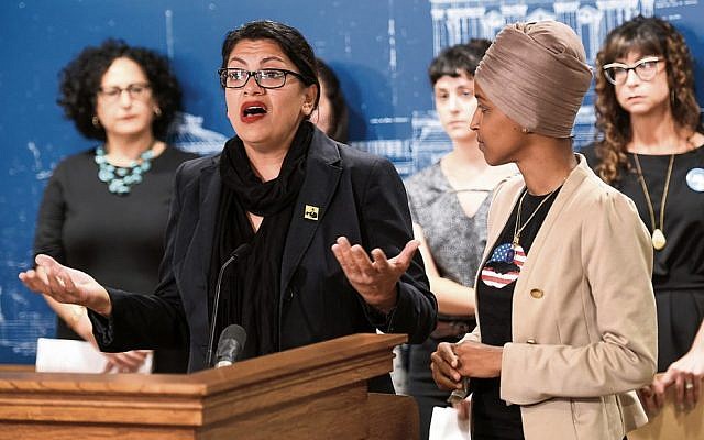Rashida Tlaib (left) speaks at a news conference on Friday as Ilhan Omar (right) looks on. Photo: EPA/Craig Lassig Rashida Tlaib (left) speaks at a news conference on Friday as Ilhan Omar (right) looks on. Photo: EPA/Craig Lassig