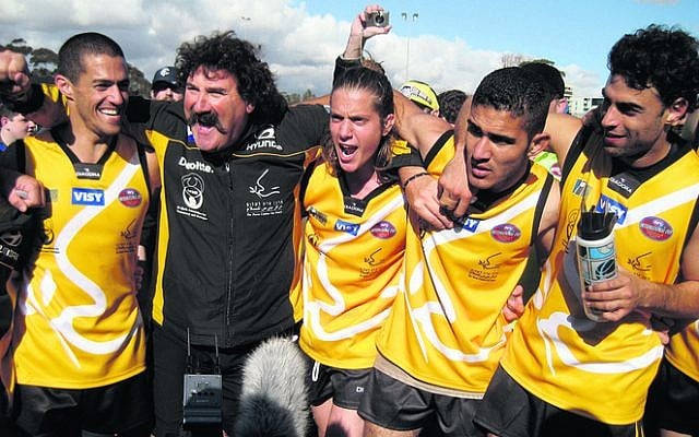AFL legend Robert DiPierdomenico
with members of the first
International Peace Team in 2008. AFL legend Robert DiPierdomenico
with members of the first
International Peace Team in 2008.