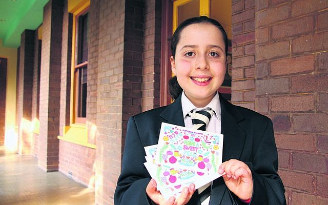 Ruby Levitt with her winning 2019 AJN Rosh Hashanah card design.
Photo: Shane Desiatnik Ruby Levitt with her winning 2019 AJN Rosh Hashanah card design.
Photo: Shane Desiatnik