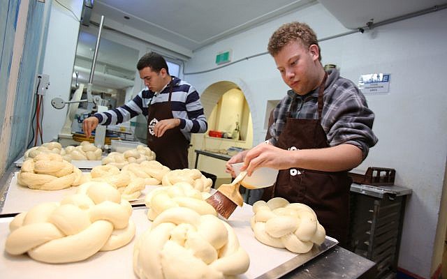 Friendship Bakery members Jonty (left) and Mikey hard at work in the kitchen. Photo: Ingrid Shakenovsky Friendship Bakery members Jonty (left) and Mikey hard at work in the kitchen. Photo: Ingrid Shakenovsky