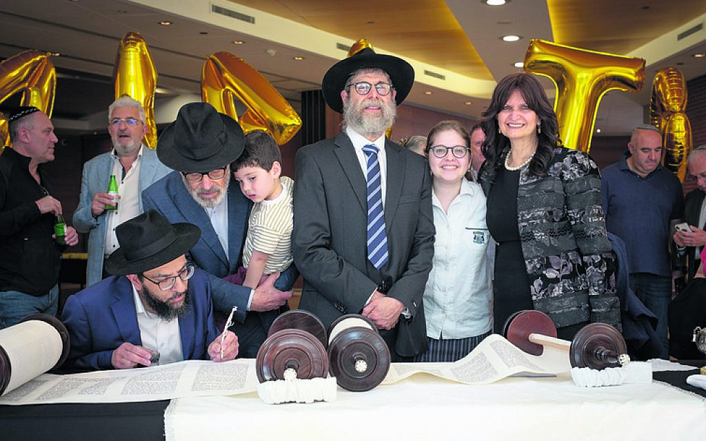 From left: Rabbi Shlomo Israel, Manfred Levy, Dovi Shapiro, Dr Harry, Rivka and Ester Hirschowitz.
