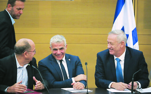 From left: Moshe Ya’alon, Yair Lapid and Benny Gantz at a Blue and White
faction meeting at the Knesset on Monday. Photo: Hadas Parush/Flash90 From left: Moshe Ya’alon, Yair Lapid and Benny Gantz at a Blue and White
faction meeting at the Knesset on Monday. Photo: Hadas Parush/Flash90