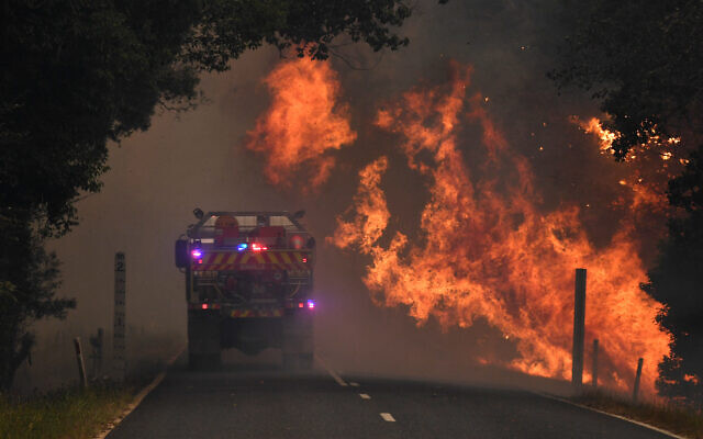 A fire truck at a bushfire near Coffs Harbour. Photo: AAP/Dan Peled A fire truck at a bushfire near Coffs Harbour. Photo: AAP/Dan Peled