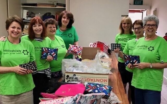 The eager volunteers of National Council of Jewish Women (Vic) get involved
for Mitzvah Day last year. The eager volunteers of National Council of Jewish Women (Vic) get involved
for Mitzvah Day last year.