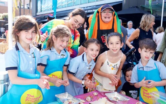From left: Chloe Kavnat, Zara Hedyt, Chana Slavin, Tia Edelmuth, Laya Slavin, Jade Placks and Jake Kavnat
celebrate the spirit of Shabbat at the Shuk in Double Bay. Photo: Giselle Haber From left: Chloe Kavnat, Zara Hedyt, Chana Slavin, Tia Edelmuth, Laya Slavin, Jade Placks and Jake Kavnat
celebrate the spirit of Shabbat at the Shuk in Double Bay. Photo: Giselle Haber