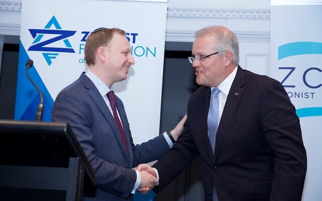 President of the Zionist Federation of Australia Jeremy Leibler awards Prime Minister Scott Morrison with the Jerusalem Prize. Photo: Giselle Haber President of the Zionist Federation of Australia Jeremy Leibler awards Prime Minister Scott Morrison with the Jerusalem Prize. Photo: Giselle Haber