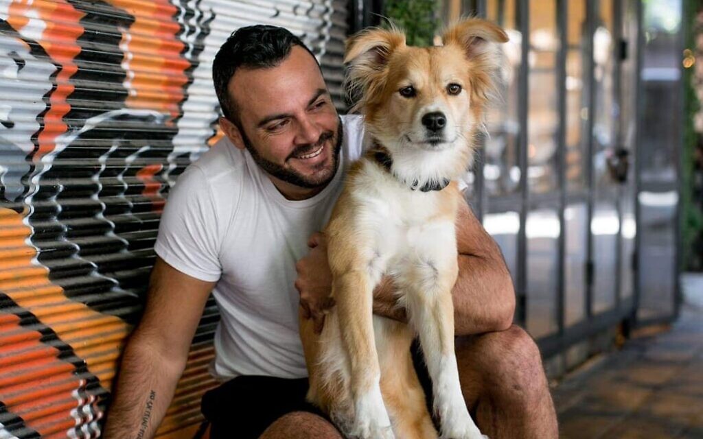 Ido Lazan with his beloved dog,
Django. Ido Lazan with his beloved dog,
Django.