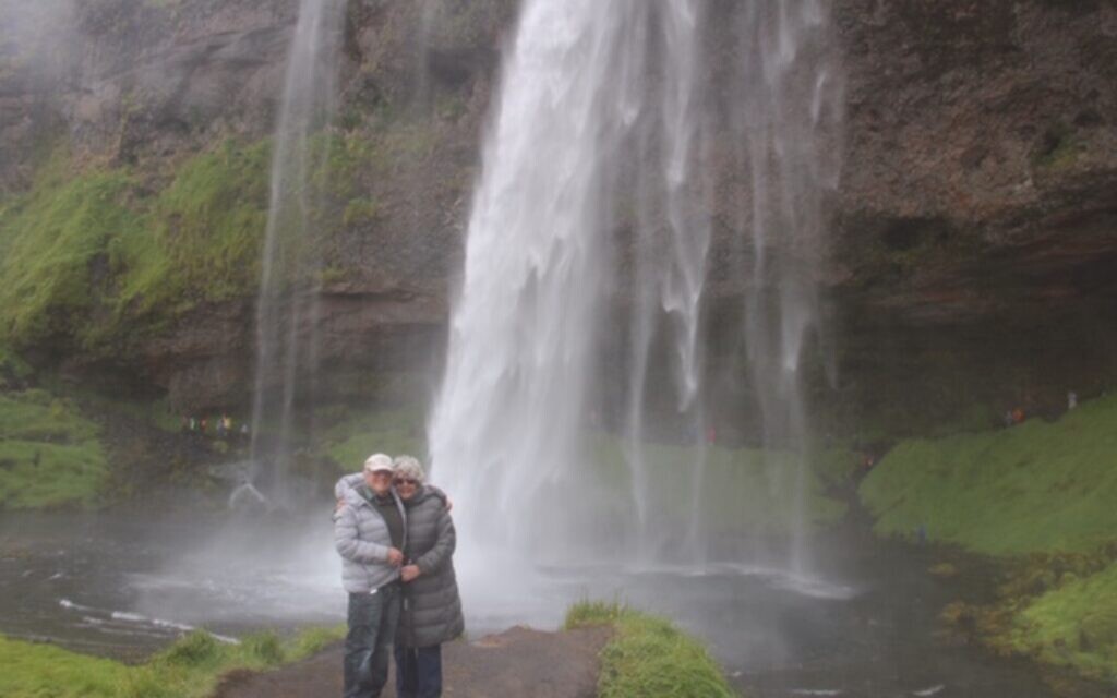 Raymond and Madeline Goodman at Greenland's Seljalandsfoss waterfall.