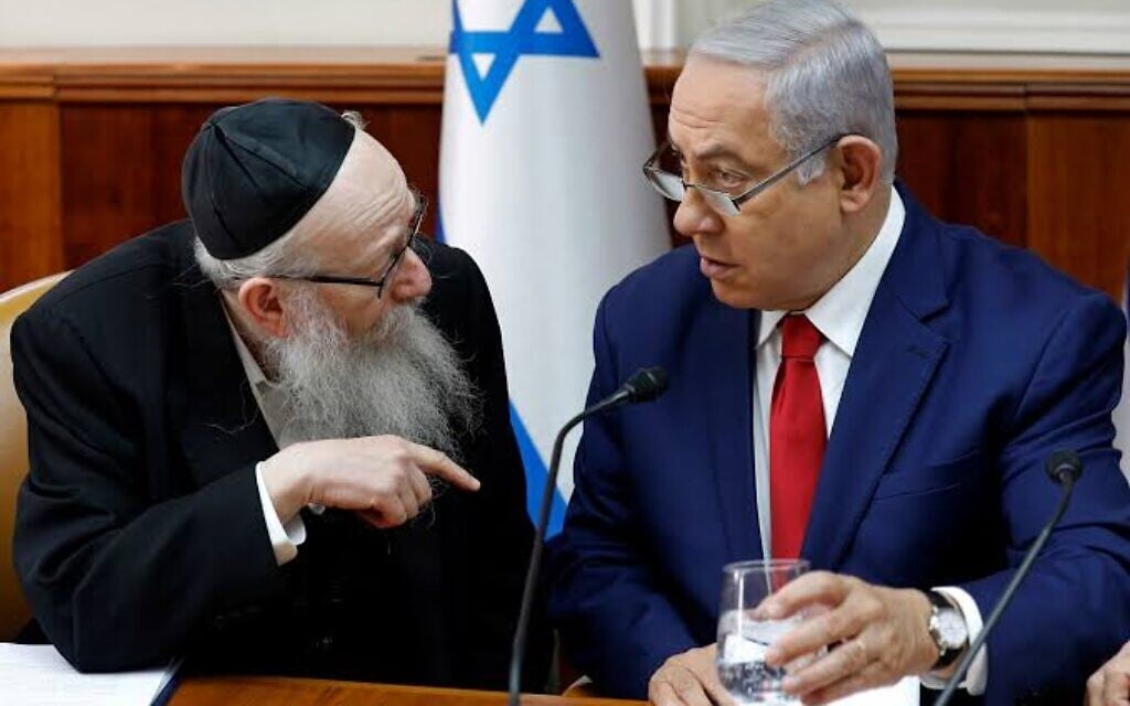 Benjamin Netanyahu, right, listens to Yaakov Litzman at the start of the the weekly cabinet meeting earlier this year in the prime minister's office in Jerusalem. Benjamin Netanyahu, right, listens to Yaakov Litzman at the start of the the weekly cabinet meeting earlier this year in the prime minister's office in Jerusalem.