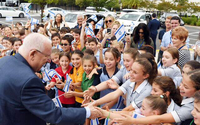 Reuven Rivlin is warmly welcomed by students of Mount Scopus Memorial
College. Photo: Kobi Gideon/GPO Reuven Rivlin is warmly welcomed by students of Mount Scopus Memorial
College. Photo: Kobi Gideon/GPO