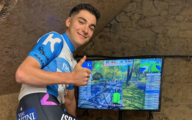 Israel Start-Up Nation team
member Alexis Renard gave
the “Stay at Home” virtual
group ride the thumbs up.
Photo: Israel Cycling Academy Israel Start-Up Nation team
member Alexis Renard gave
the “Stay at Home” virtual
group ride the thumbs up.
Photo: Israel Cycling Academy