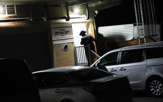 One of several men seen entering the synagogue for a minyan earlier this week. One of several men seen entering the synagogue for a minyan earlier this week.