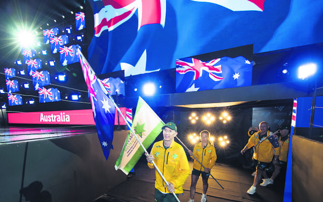 Sean Bloch leading the Australian team at the opening ceremony of the
2017 Maccabiah Games. Photo: Julie Kerbel Sean Bloch leading the Australian team at the opening ceremony of the
2017 Maccabiah Games. Photo: Julie Kerbel