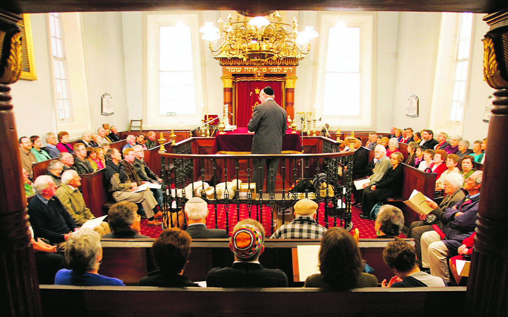 Rabbi John Levi leading the 160th anniversary celebrations in 2005. Photo: Courtesy of the Hobart Mercury Rabbi John Levi leading the 160th anniversary celebrations in 2005. Photo: Courtesy of the Hobart Mercury